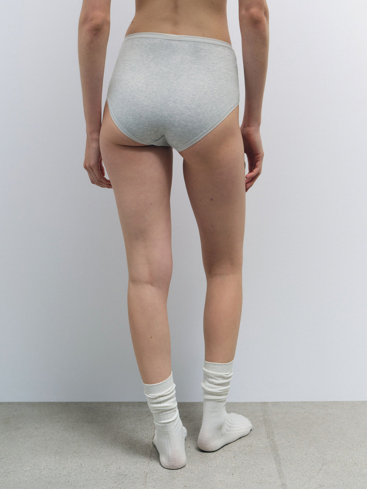 Light gray Organic Cotton high waist brief on a model, showing smooth jersey fabric and full coverage.