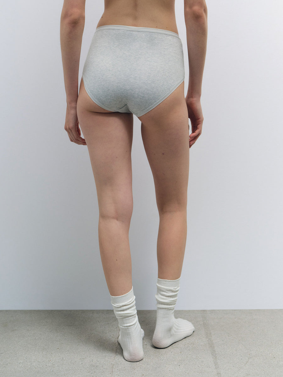 Light gray Organic Cotton high waist brief on a model, showing smooth jersey fabric and full coverage.