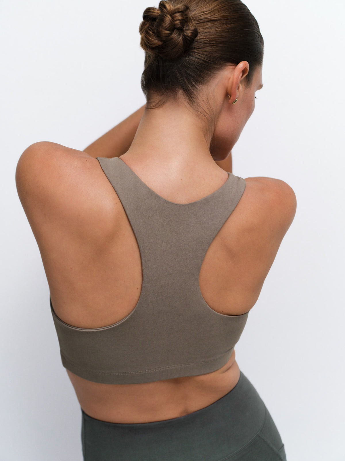 Organic Stretch Sports Bra Pocket Legging in Pebble / Forest — product photo