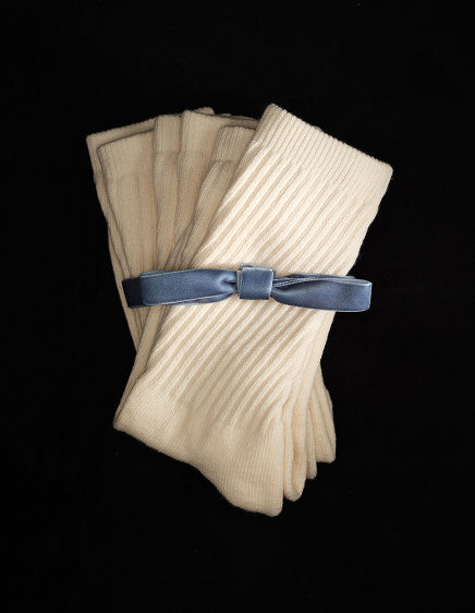 Cream ribbed knit bundle tied with a blue velvet ribbon – MATE the Label holiday