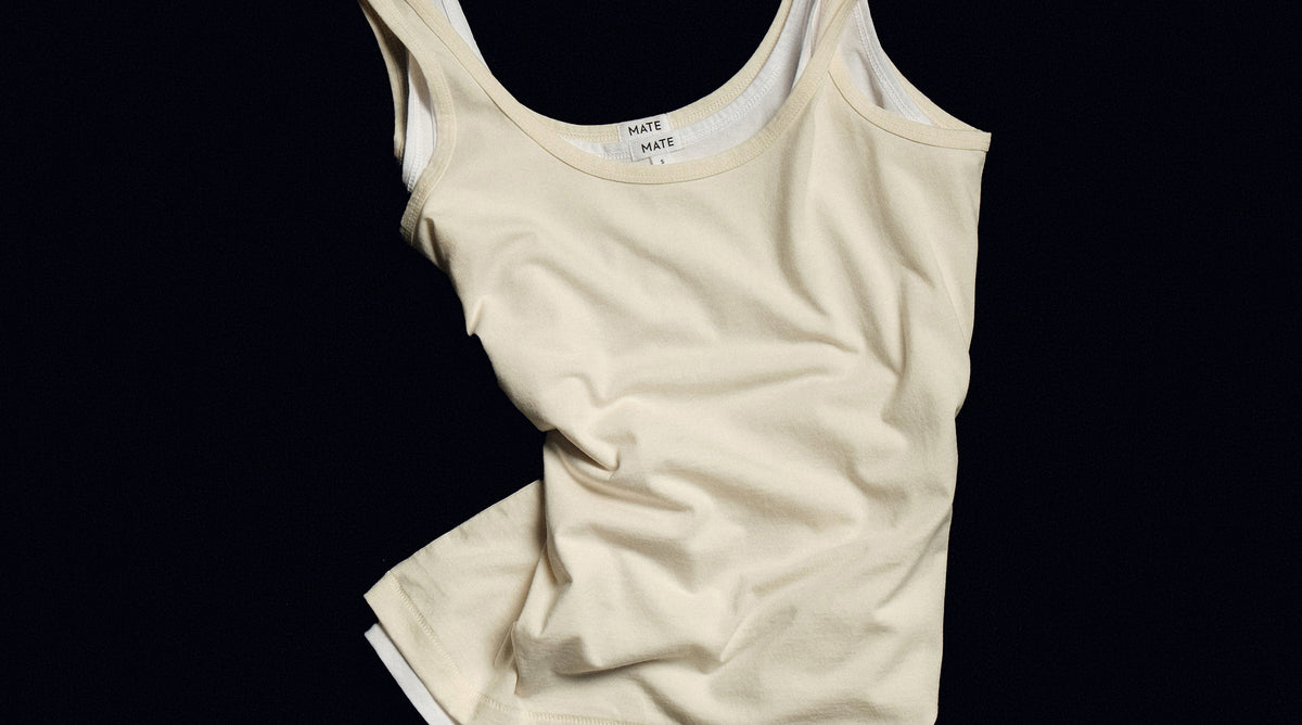 Editorial background image supporting MATE's Dress Clean message about lower-impact materials.